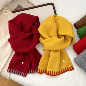 Two-tone wool knit scarf for winter with button detail and contrasting stripes