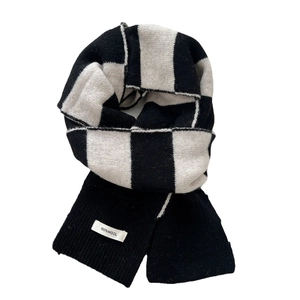 Classic black and white striped wool knit scarf for winter warmth and elegant style