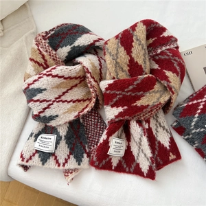 Thick geometric argyle knit scarf in red, grey and cream with woven label detail