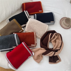 Two-tone wool knit scarves with metal logo and contrast borders in various colors