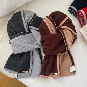 Grey and brown two-tone wool scarves for men and women featuring metal brand tags