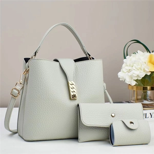 Pale green soft leather 3-piece bag set with top handle and crossbody strap