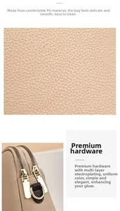 Détail de cuir PU beige avec texture litchi et fermeture éclair en métal doré poli