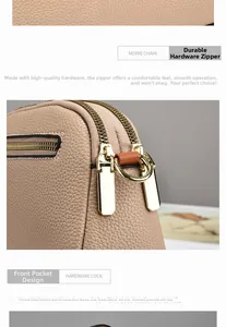 Close-up of pebble grain leather bag with smooth golden metal zipper and hidden front pocket