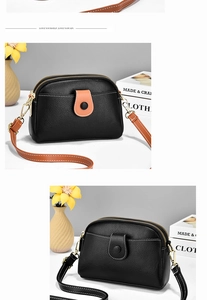 Detail of dual-zipper crossbody bags with lychee texture and gold-tone metal hardware