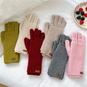 Knitted touchscreen gloves in multiple colors with stylish ribbed cuffs and leather tags