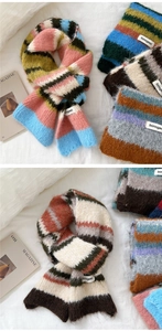 Detailed macro view of soft knit scarf featuring colorful stripes and fuzzy mohair texture