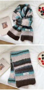 Close-up of thick multi-color striped knitted scarf with fuzzy texture and brand label