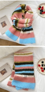 Detail of colorful striped knit scarf with soft mohair texture and bonogeed label