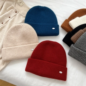 Classic ribbed knit beanie hats for men and women available in multiple colors