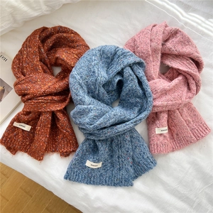 Winter chunky knit scarves in orange, blue and purple with colorful tweed speckles