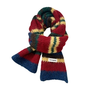 Colorful striped knit scarf with warm rainbow patterns and soft wool-like texture