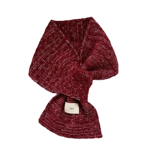 Deep red knitted cross scarf with ins tag, warm winter neck wrap on white background