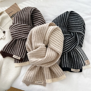 Striped knit scarves in coffee, beige and black colors with woven brand labels