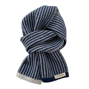 Striped navy blue and gray knitted scarf for winter with stylish textured fringe details