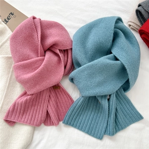 Soft knitted winter scarf in pink and peacock blue colors with stylish ribbed cuffs