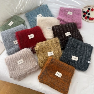 Minimalist soft knit winter scarf for women in bicolor design with fluffy mohair texture