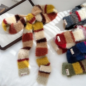 Colorful striped fluffy knit scarf for women with soft faux fur texture and brand label