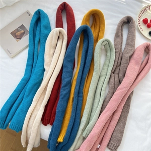 Chic skinny knit scarves for women in various colors with thick ribbed texture details