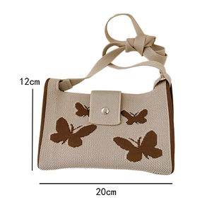 Detailed view of 20x12cm knitted butterfly crossbody bag showing dimensions and size