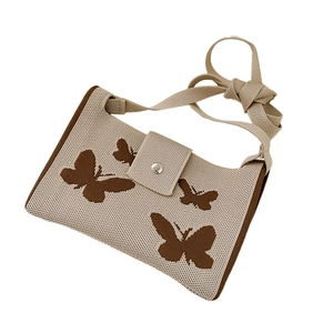 Chic knitted crossbody bag with butterfly pattern and silver magnetic closure