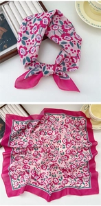 Detailed view of floral cotton linen neckerchief tied and flat in pink and rose tones