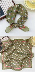 Detail of green floral cotton linen neckerchief with red and white contrast piping
