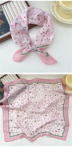 Detail of pink floral cotton linen square scarf with delicate patterns and elegant print