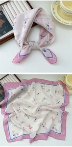 Detailed view of floral cotton linen neck scarf with purple borders and elegant patterns