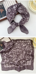 Detailed view of square cotton linen scarf with elegant white floral and vine patterns