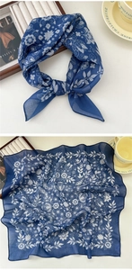 Detailed views of a navy blue floral cotton linen square scarf with vintage white patterns