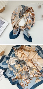 Detailed pattern of floral silk square scarf with magnolia prints and traditional clouds