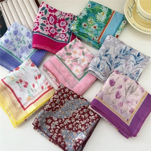 Various floral print cotton linen square scarves with tulip and daisy patterns