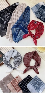 Close-up of cotton linen square scarves with paisley and floral prints on a tray