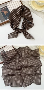 Detail of soft cotton linen square scarf with brown polka dots for versatile styling