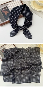 Detail of a soft cotton-linen scarf with black and white polka dot pattern for women