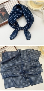 Detail of soft navy blue polka dot cotton linen square scarf with elegant French style
