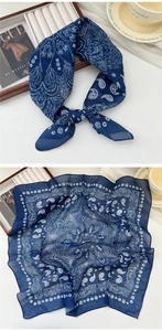 Navy blue paisley cotton scarf detail showing knot style and flat layout