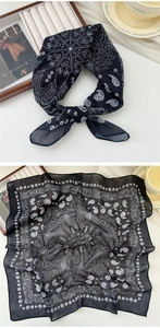 Detail of soft black cotton linen square scarf with vintage paisley and mandala pattern