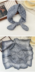 Detail showing blue paisley cotton linen square scarf with delicate hemmed edges