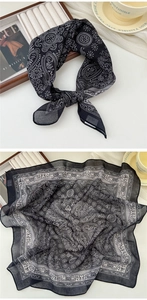 Detail of cotton linen paisley square scarf showing texture and elegant black white pattern
