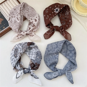 Set of four cotton linen scarves featuring paisley patterns for versatile styling