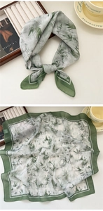 Detailed view of floral cotton linen square scarf with green bamboo leaf print