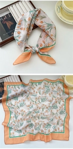 Detail of floral square scarf with orange tulip pattern and tricolor contrast borders
