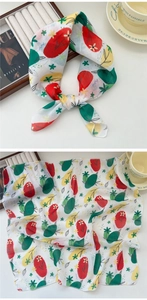 Detail of floral printed cotton linen scarf with colorful abstract patterns and art design