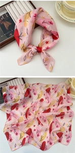 Detailed shot of pink floral cotton linen scarf with soft breathable fabric and neat edges