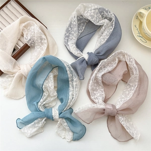 Chiffon and lace patchwork scarf set in soft pastel colors with floral embroidery detail