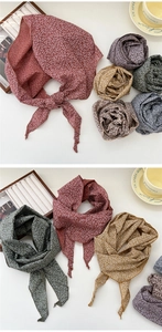 Detail of floral cotton linen neckerchiefs in vintage colors with elegant draping