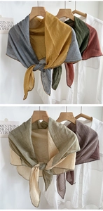 Detail showing the dual-color stitching and linen texture of the diamond fashion scarf