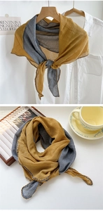 Detailed texture of cotton linen scarf with contrast color blocking and crochet lace edge